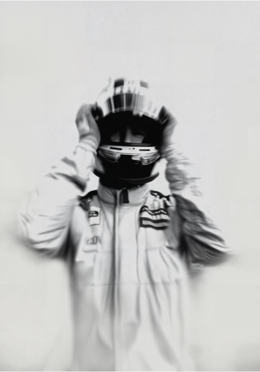 Racing driver in an Ascari Piloto suit